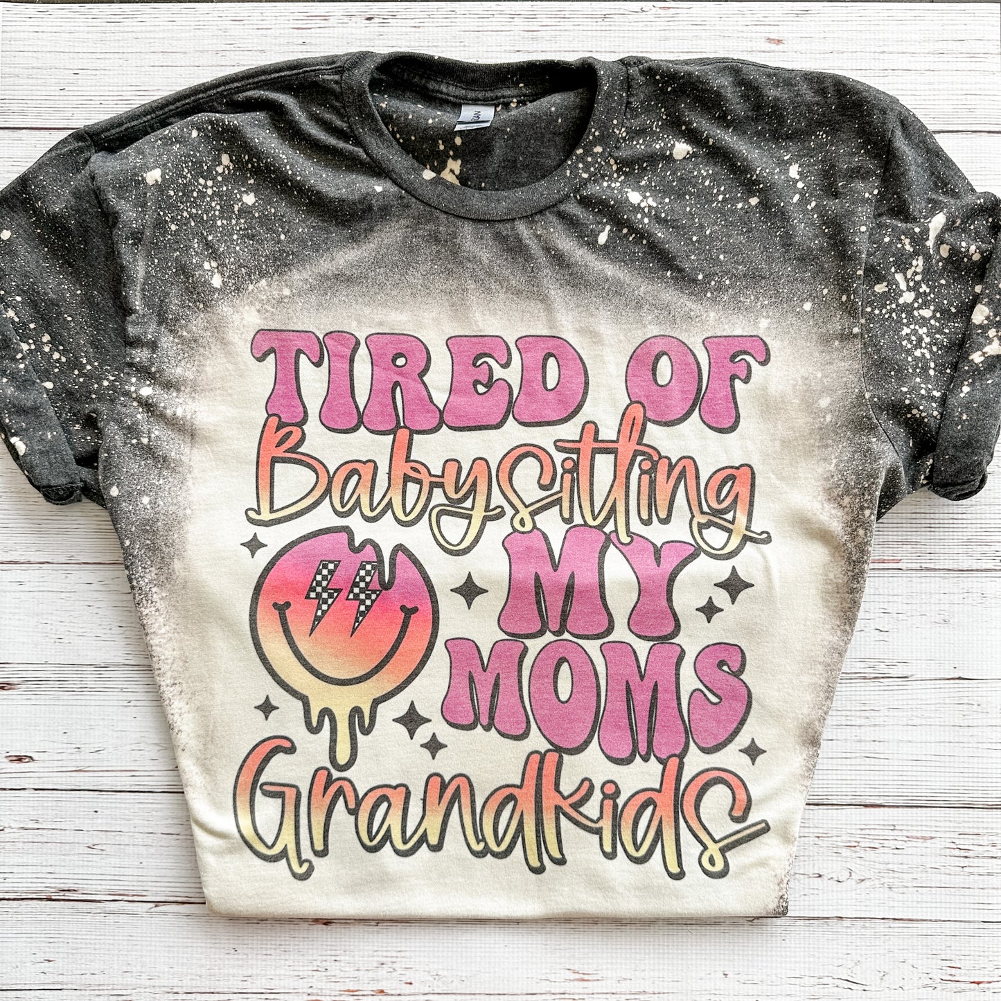 Tired of Babysitting My Mom’s Grandkids Bleached Tee